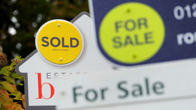 File photo dated 14/10/14 of estate agents signs. 