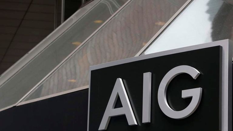 A new sign is displayed over the entrance to the AIG headquarters offices in New York's financial district