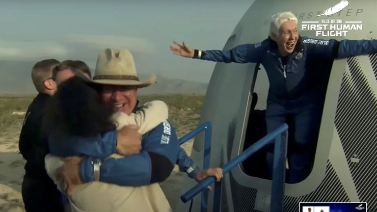 Wally Funk celebrates as Mr Bezos hugs his parents. Pic: Blue Origin