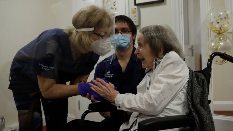 Care home resident Joan Potts, aged 102, has received a first dose of a COVID vaccine. Pic: AP