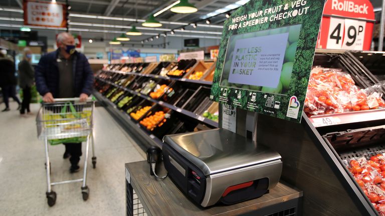 Scales to weigh loose fresh produce are seen in the UK supermarket Asda, as the store launches a new sustainability strategy, in Leeds, Britain, October 19, 2020. Picture taken October 19, 2020. REUTERS/Molly Darlington
