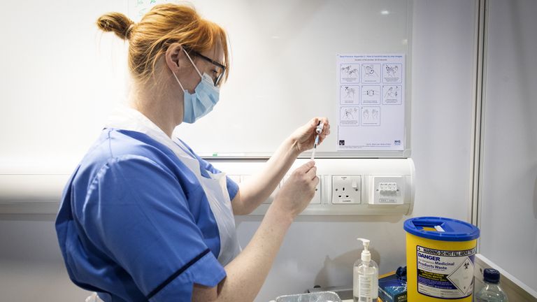 Nurse prepares vaccine