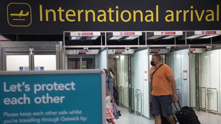 Passengers arrive at Gatwick Airport, West Sussex, before Tuesday's 4am requirement for travellers arriving from Portugal to quarantine for 10 days comes into force. Picture date: Monday June 7, 2021.