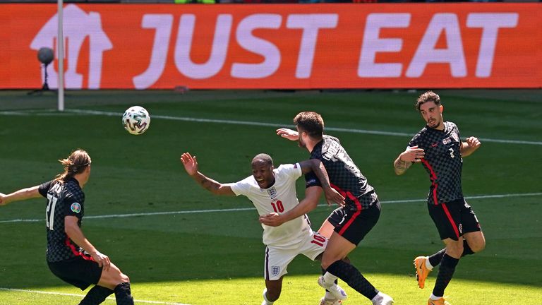 England's Raheem Sterling is tackled by Croatia's Duje Caleta-Car during the UEFA Euro 2020 Group D match at Wembley Stadium, London. Picture date: Sunday June 13, 2021.