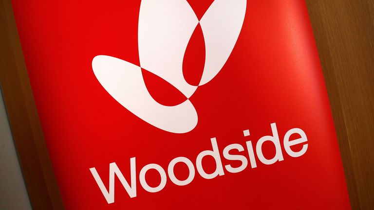 The logo for Woodside Petroleum, Australia's top independent oil and gas company, adorns a promotional poster on display at a briefing for investors in Sydney, Australia, May 23, 2018