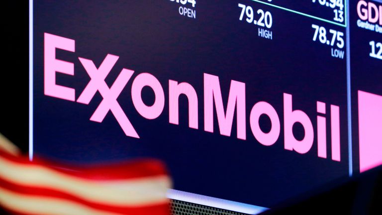 FILE - In this April 23, 2018, file photo, the logo for ExxonMobil appears above a trading post on the floor of the New York Stock Exchange.  Exxon Mobil on Tuesday, March 3, 2020,  outlined how it is reducing the methane its operations release into the atmosphere, detailing its efforts as governments around the globe write new rules to regulate the harmful greenhouse gas. (AP Photo/Richard Drew, File)