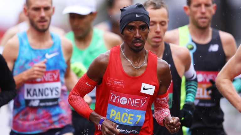 Athletics - London Marathon - London, Britain - October 4, 2020 Pacemaker Britain's Mo Farah with runners during the elite men's race Pool via REUTERS/Richard Heathcote