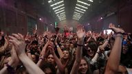 People enjoy their time at a nightclub, as part of a national research programme assessing the risk of the coronavirus disease (COVID-19) transmission, in Liverpool, Britain April 30, 2021. REUTERS/Carl Recine