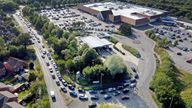 Motorists queue to fill their cars at a Tesco fuel station in Ashford, Kent. Picture date: Saturday September 25, 2021.