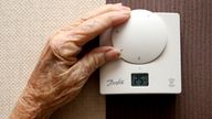 Jane Burney 94, from Childwall alters the thermostat in her home. The start of winter effects pensioners with concerns over heating bills PRESS ASSOCIATION Photo. Issue date: Wednesday November 19, 2014. See PA story . Photo credit should read: Peter Byrne/PA Wire