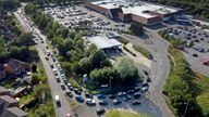 Motorists queue to fill their cars at a Tesco fuel station in Ashford, Kent. Picture date: Saturday September 25, 2021.