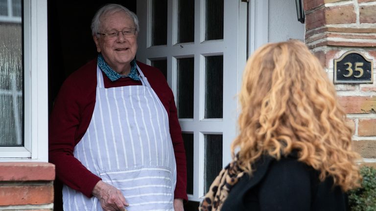 A volunteer makes a delivery of hot food for the Chichester Cathedral Friday lunch club