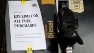 A sign advising people about a limit on fuel is attached to an empty petrol pump at a Texaco filling station in Manchester, Britain, September 28, 2021. REUTERS/Phil Noble