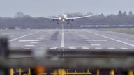 A British Airways plane landing at Gatwick airport