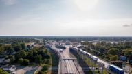 An aerial view of Canada and the United States of semis waiting to cross at The International Border Crossing