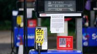 Fuel pumps are out of use at a deserted Esso petrol station forecourt in Solihull, Birmingham