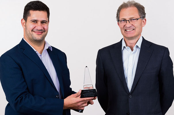 Alberto Garcia Naranjo of CN Bio (left) accepts the Sir Michael Marshall Engineering Excellence Award from Robert Marshall