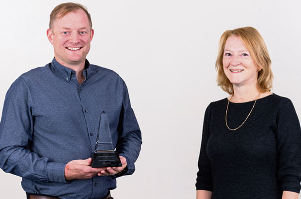 Claire Ruskin of Cambridge Network presents the inaugural Sustainability Champion Award to SATAVIA founder and CEO Adam Durant.