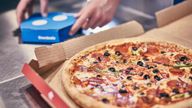 EDITORIAL USE ONLY Domino's branding. PRESS ASSOCIATION Photo. Photo credit should read: John Godwin/PA Wire