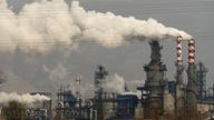 FILE  In this Nov. 28, 2019 file photo, smoke and steam rise from a coal processing plant in Hejin in central China's Shanxi Province. (AP Photo/Olivia Zhang, File)