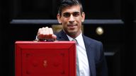 Britain's Chancellor of the Exchequer Rishi Sunak holds the budget box outside Downing Street in London, Britain, October 27, 2021. REUTERS/Peter Nicholls
