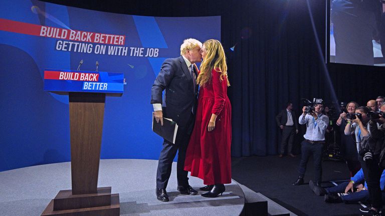 Prime Minister Boris Johnson is joined by his wife Carrie on stage after delivering his keynote speech at the Conservative Party Conference in Manchester. Picture date: Wednesday October 6, 2021.