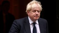 Britain's Prime Minister Boris Johnson walks outside Downing Street, following the death of British MP David Amess who was stabbed to death during a meeting with constituents, in London, Britain, October 18, 2021. REUTERS/Henry Nicholls
