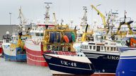 Fishing boats moored in the port of Boulogne, France. Environment Secretary George Eustice has warned France the UK could retaliate if it goes ahead with threats in the fishing row, warning that "two can play at that game". Picture date: Friday October 29, 2021.