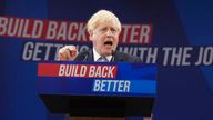 Britain's Prime Minister Boris Johnson gestures as he makes his keynote speech at the Conservative party conference in Manchester