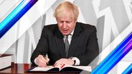 Boris Johnson signs the Brexit trade deal