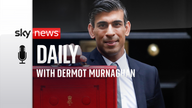 Britain's Chancellor of the Exchequer Rishi Sunak holds the budget box outside Downing Street in London, Britain, October 27, 2021. REUTERS/Peter Nicholls