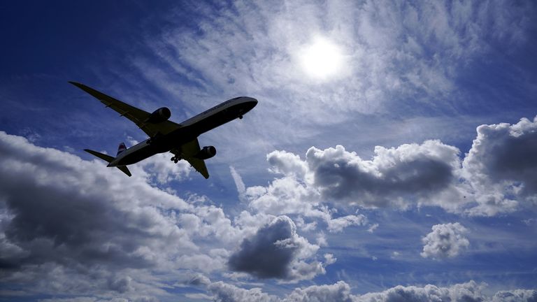 A plane lands on the southern runway at London Heathrow Airport. US and EU travellers who are fully vaccinated against coronavirus will be allowed to enter England and Scotland without the need to quarantine from Monday. Travellers will be required to take a pre-departure test, and a PCR test on or before the second day after their arrival. Picture date: Thursday July 29, 2021.