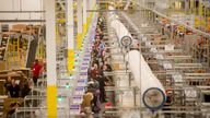 Workers prepare outgoing shipments at an Amazon Fulfillment Center, ahead of the Christmas rush, in Tracy, California, November 30, 2014. REUTERS/Noah Berger (UNITED STATES - Tags: BUSINESS SOCIETY TPX IMAGES OF THE DAY)
