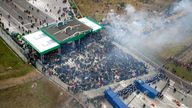 Polish police block migrants who gather on the Belarusian-Polish border in an attempt to cross it at the Kuznica Bialostocka-Bruzgi border crossing, Poland in this photograph released by the Police, November 15, 2021. Policja Podlaska/Handout via REUTERS NO RESALES. NO ARCHIVES. MANDATORY CREDIT. THIS IMAGE HAS BEEN SUPPLIED BY A THIRD PARTY. TPX IMAGES OF THE DAY
