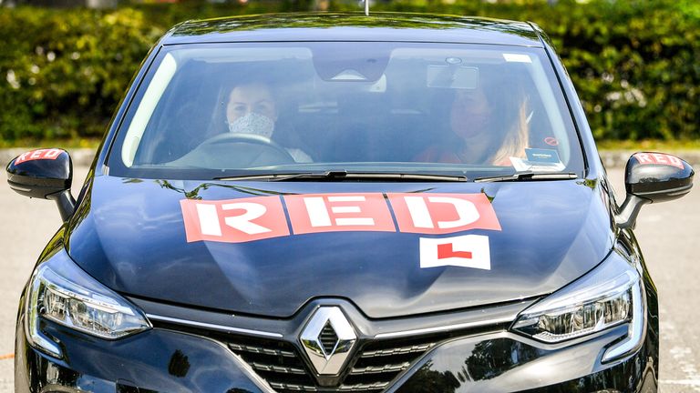 File photo dated 22/07/20 of a student driver with her instructor in Yeovil, Somerset. 