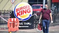 A man walks past a closed Burger King at the Tottenham Hale Retail Park in London as the UK continues in lockdown to help curb the spread of the coronavirus 24/4/2020