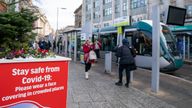 Coronavirus guidance on signs in Nottingham where one of the two cases of the Omicron variant were identified last week