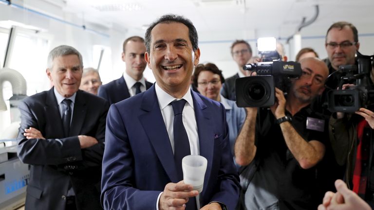 Franco-Israeli businessman Patrick Drahi (C), Executive Chairman of cable and mobile telecoms company Altice, attends the inauguration of the Drahi-X Novation Center, dedicated to entrepreneurship and innovation, at the Ecole Polytechnique at the Saclay Paris-Sud University in Orsay, France, April 19, 2016