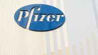 Karlsruhe, Germany - March 5, 2011:  Pfizer logo on a viagra store in Germany. Pfizer Inc. is one of the worlds biggest Pharma companies. Company was founded in 1849. This is the logo on a big store for viagra anti-impotence tablets in Karlsruhe / Germany. Viagra is famous all over the world because it is against impotence and potency problems .