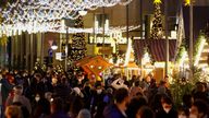 People visit the Breitscheid square Christmas market, amid the coronavirus disease (COVID-19) pandemic, in Berlin, Germany, November 22, 2021. REUTERS/Fabrizio Bensch
