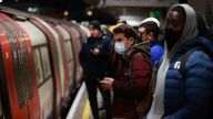 People wear face masks on the London underground, as the spread of the coronavirus disease (COVID-19) continues in London, Britain, November 30, 2021. REUTERS/Hannah McKay