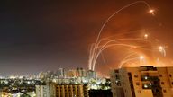 FILE PHOTO: Streaks of light are seen as Israel's Iron Dome anti-missile system intercepts rockets launched from the Gaza Strip towards Israel, as seen from Ashkelon, Israel, May 12.   REUTERS/Amir Cohen//File Photo