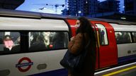 A person wears a face mask at a London underground station