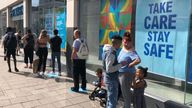 BRIGHTON, UNITED KINGDOM - JUNE 15: (EDITOR'S NOTE: Image taken with a iPhone 8) Shoppers queue for the Primark store on June 15, 2020 in Brighton, United Kingdom. The British government have relaxed coronavirus lockdown laws significantly from Monday June 15, allowing zoos, safari parks and non-essential shops to open to visitors. Places of worship will allow individual prayers and protective facemasks become mandatory on London Transport. (Photo by Mike Hewitt/Getty Images)