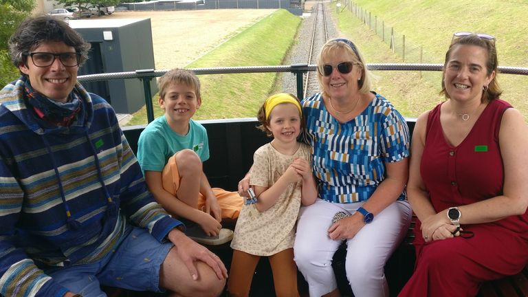 Hannah Pickersgill (far right in red) and her family on holiday in South Africa for her sister's wedding.