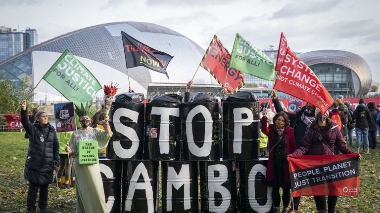 Activists from Friends of the Earth during a demonstration calling for an end to all new oil and gas projects in the North Sea, starting with the proposed Cambo oil field, outside the UK Government's Cop26 hub during the Cop26 summit in Glasgow. Picture date: Sunday November 7, 2021.