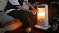 A generic stock photo of an elderly lady with her electric fire on at home in Liverpool. PRESS ASSOCIATION Photo. Picture date: Wednesday November 19, 2014. Photo credit should read: Peter Byrne/PA Wire 