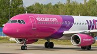 24 August 2020, Brandenburg, Sch'nefeld: A passenger plane of the Hungarian low-cost airline Wizz Air Hungary Ltd. is parked at Berlin-Sch'nefeld Airport. Photo by: Patrick Pleul/picture-alliance/dpa/AP Images