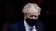 British Prime Minister Boris Johnson walks outside Downing Street in London, Britain, January 12, 2022. REUTERS/Paul Childs
