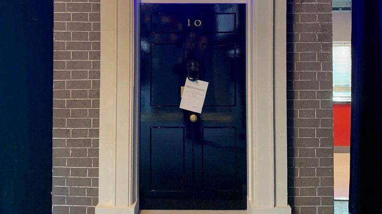 The door to No 10 made of cardboard